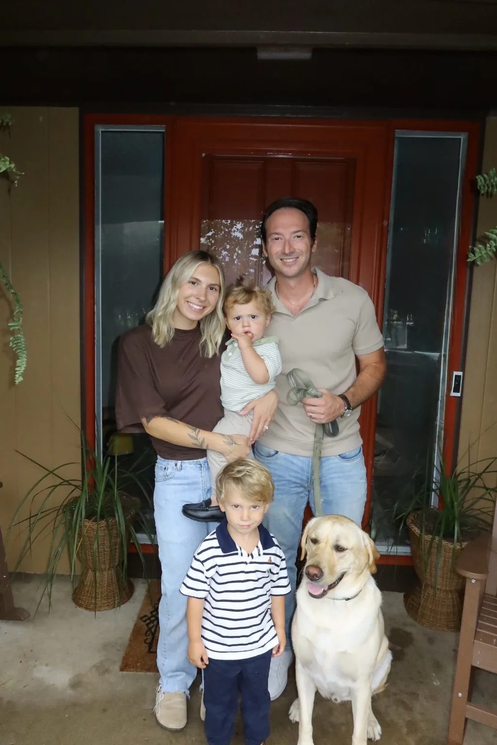 Spencer with his family, including Sutton, and their dog